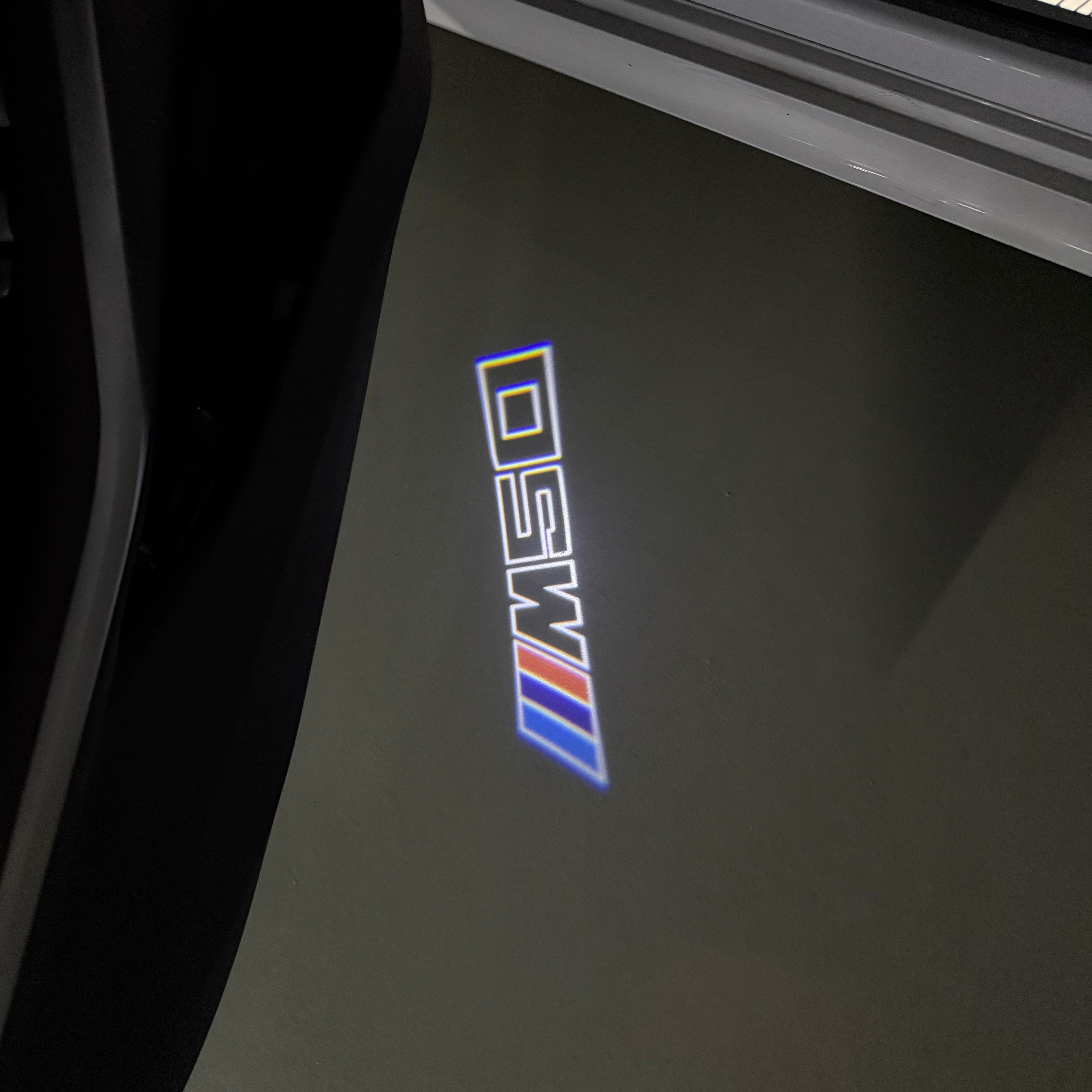 LUCES DE PROYECTOR DEL LOGOTIPO BMW M3 Nr.24 (cantidad 1 = 1 juegos / 2 luces de puerta)