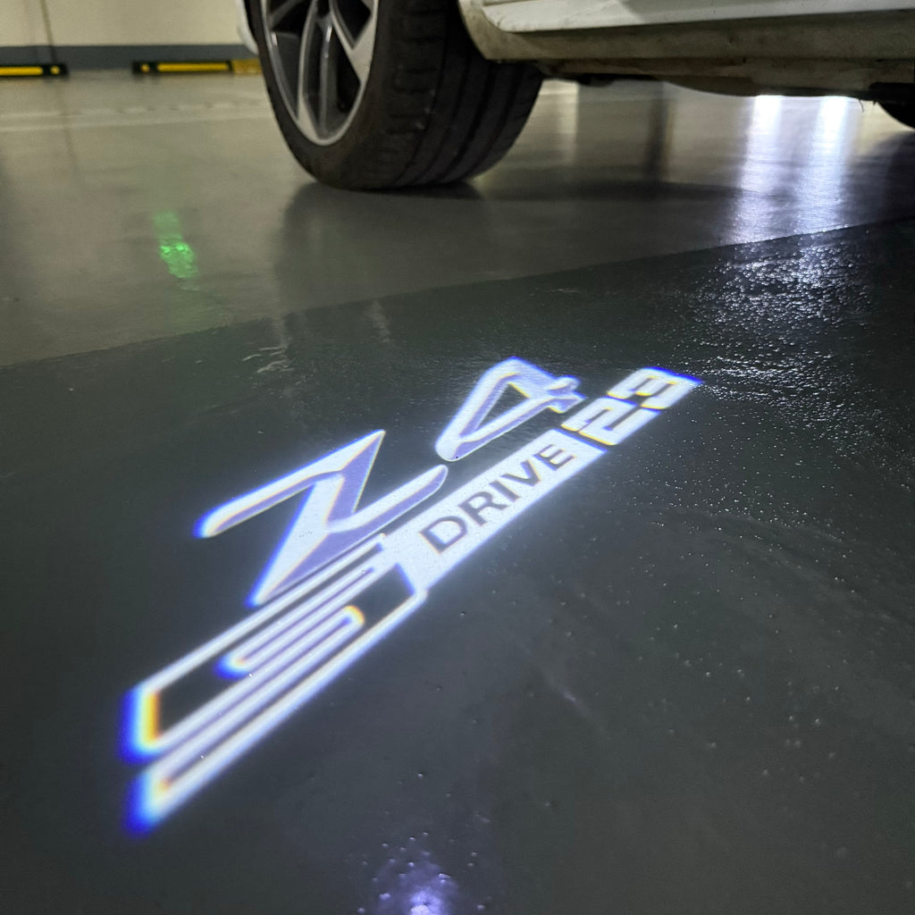 LUCES DE PROYECTOR DEL LOGOTIPO BMW M3 Nr.24 (cantidad 1 = 1 juegos / 2 luces de puerta)