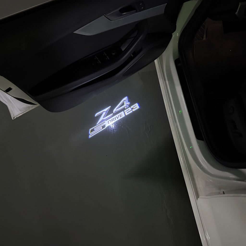 LUCES DE PROYECTOR DEL LOGOTIPO BMW M3 Nr.24 (cantidad 1 = 1 juegos / 2 luces de puerta)