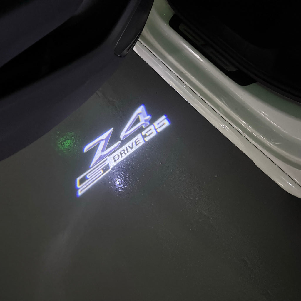 ÉCLAIRAGE DE PROJECTEUR BMW M3 LOGO Nr.24 (quantité 1 = 1 jeux / 2 feux de porte)