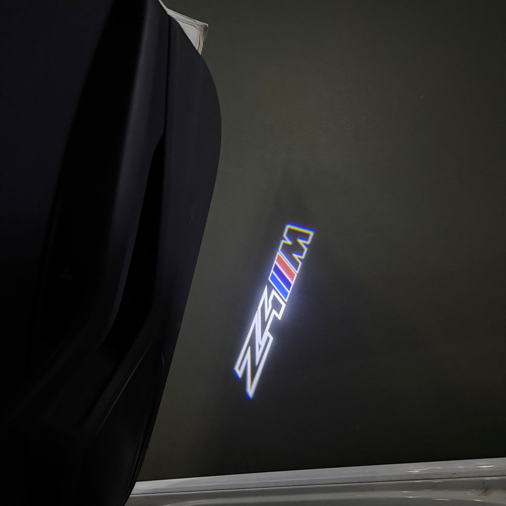 LUCES DE PROYECTOR DEL LOGOTIPO BMW M3 Nr.24 (cantidad 1 = 1 juegos / 2 luces de puerta)