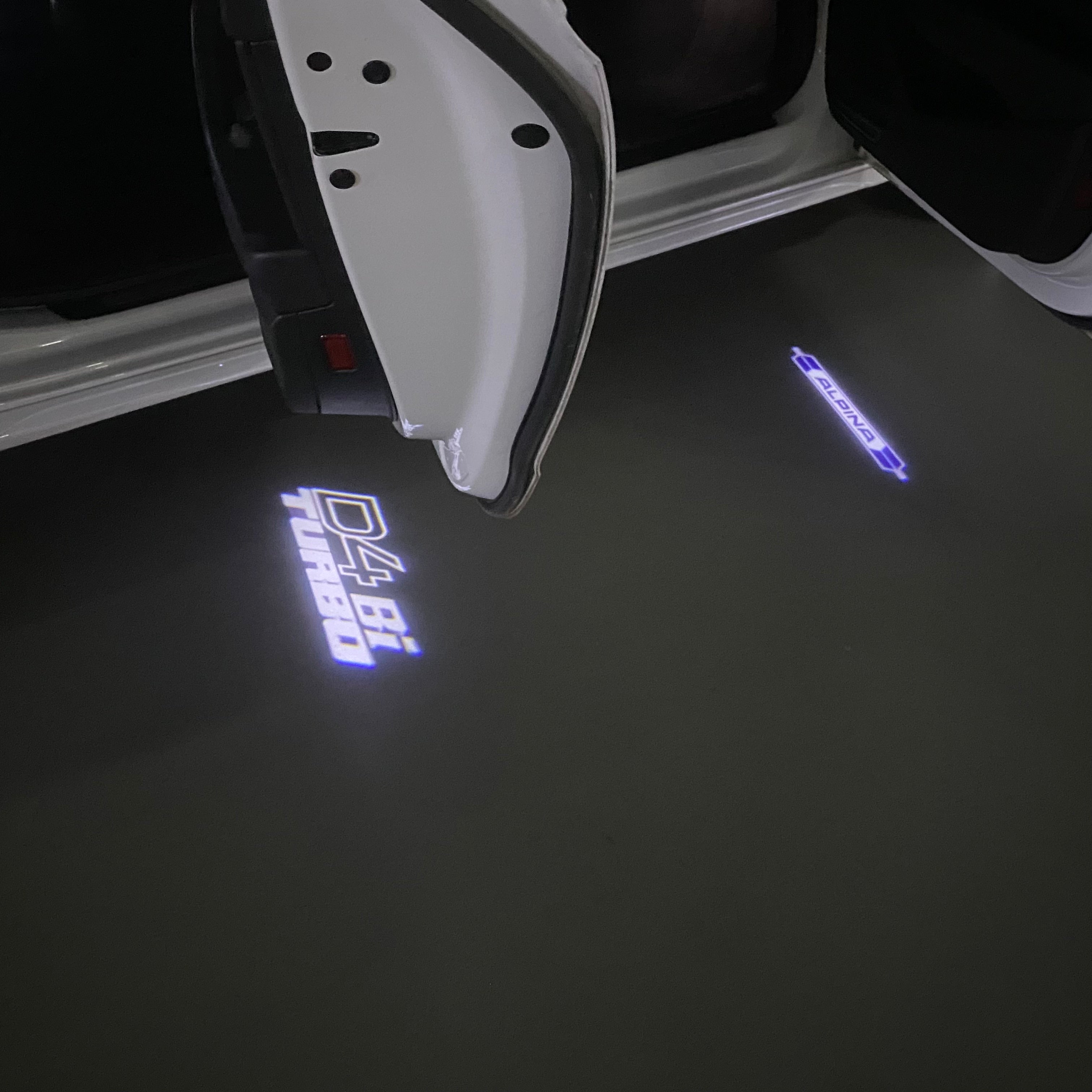 ALPINA D4  Bi TURBO LOGO PROJECTOT LIGHTS  (quantity 1 = 1 sets/2 door lights) Nr.07A48