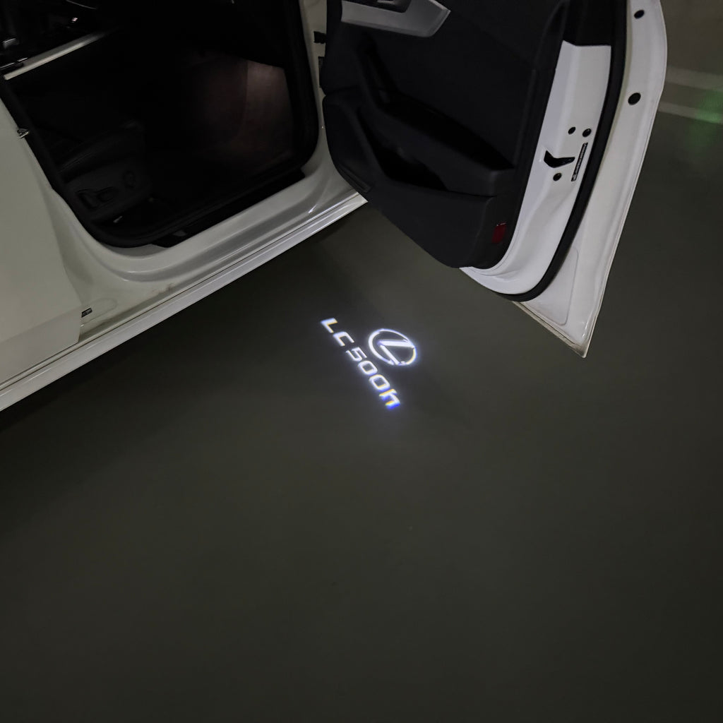 LEXUS LOGO PROJECTOR LIGHTS Nr.01 (الكمية 1 = 1 مجموعة / 2 أضواء باب)