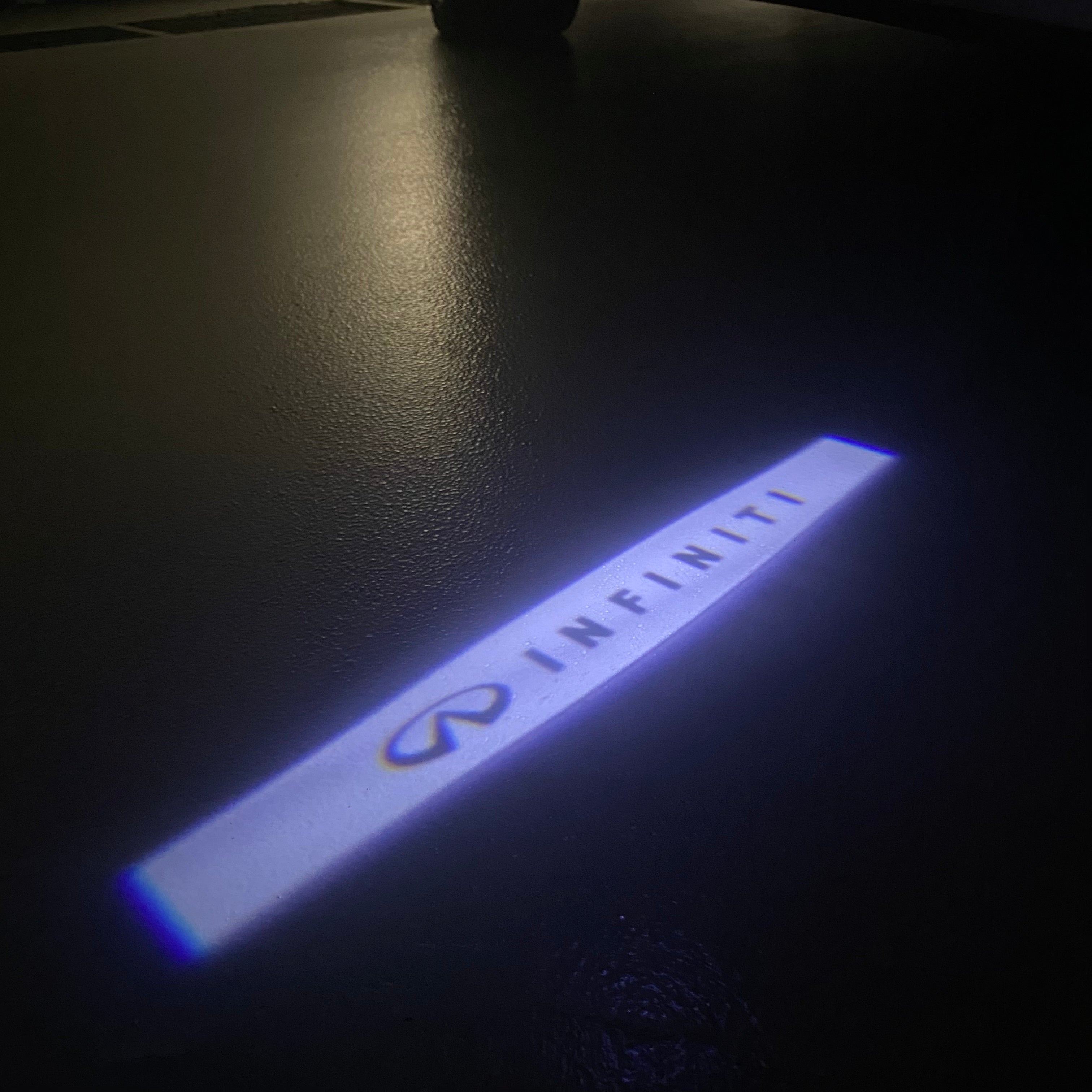 INFINTI LOGO PROJECROTR LIGHTS Nr.17 (quantité 1 = 1 ensemble/2 feux de porte)
