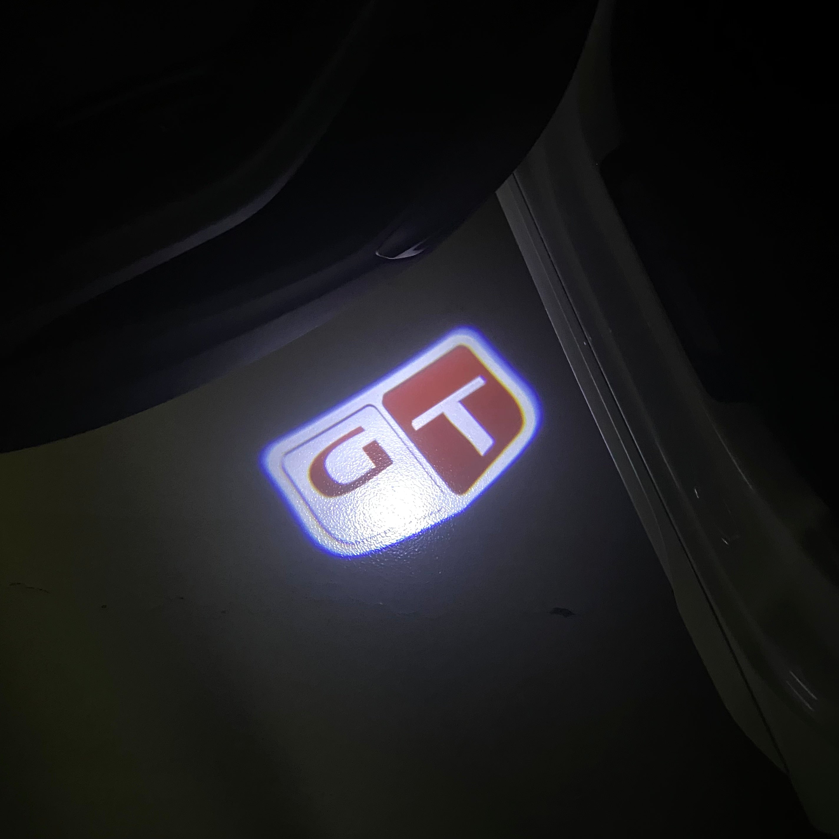 ÉCLAIRAGE DE PROJECTEUR INFINITI GT LOGO N ° 25 (quantité 1 = 1 jeux / 2 lumières de porte)