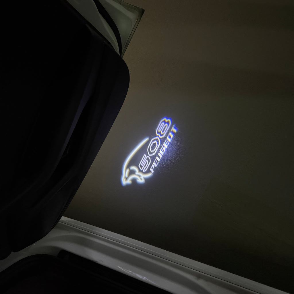 LUCES DE PROYECTOR DEL LOGOTIPO BMW M3 Nr.24 (cantidad 1 = 1 juegos / 2 luces de puerta)