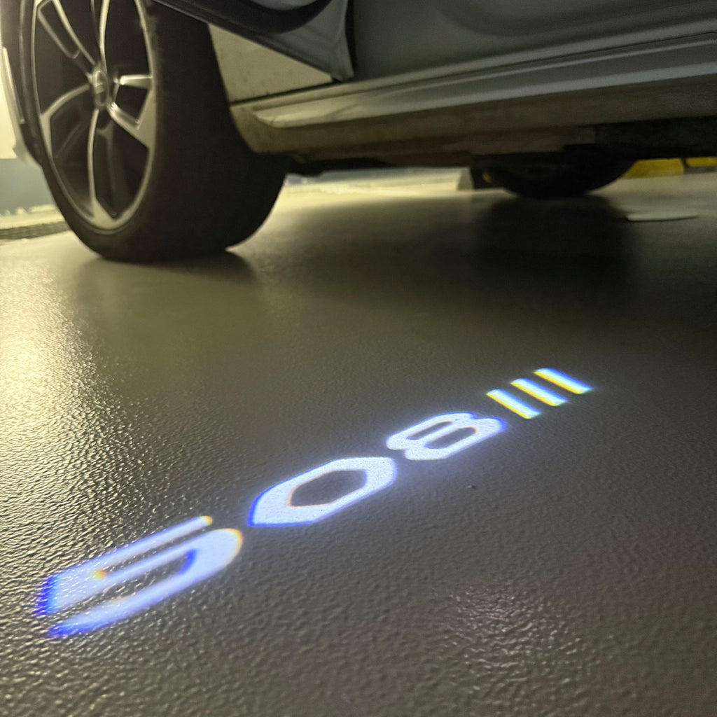 ÉCLAIRAGE DE PROJECTEUR BMW M3 LOGO Nr.24 (quantité 1 = 1 jeux / 2 feux de porte)