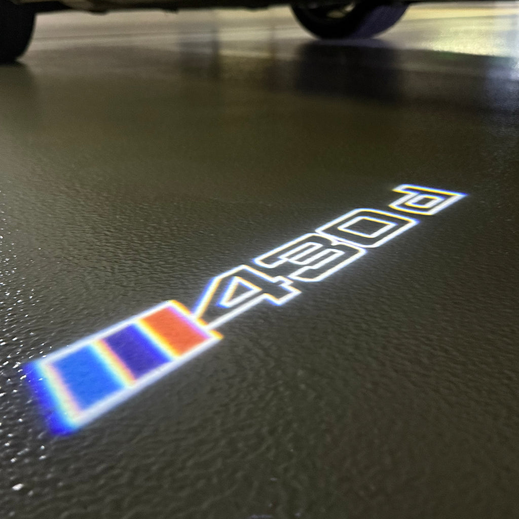 LUCES DE PROYECTOR DEL LOGOTIPO BMW M3 Nr.24 (cantidad 1 = 1 juegos / 2 luces de puerta)
