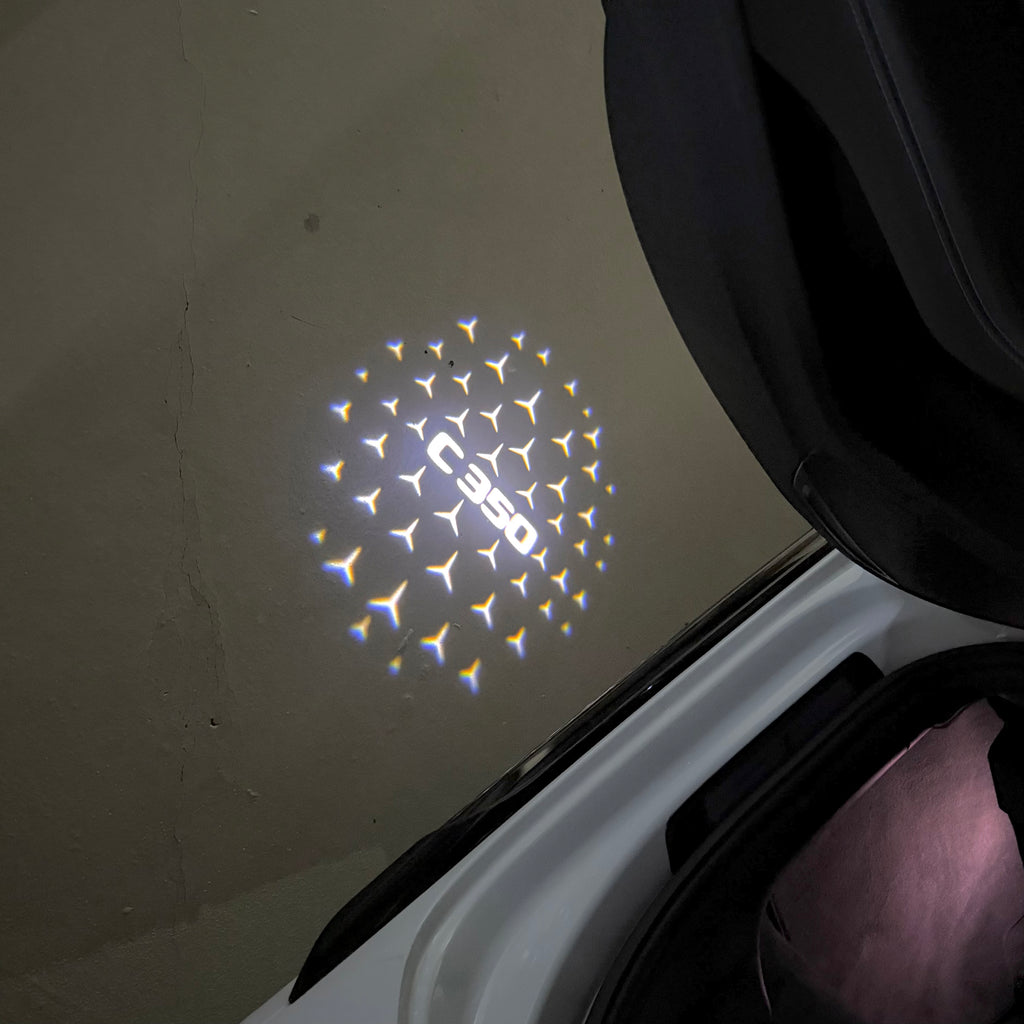 LUCI PROIETTORI LOGO MERCEDES BENZ Nr.03 (quantità 1 = 1 set / 2 luci porta)
