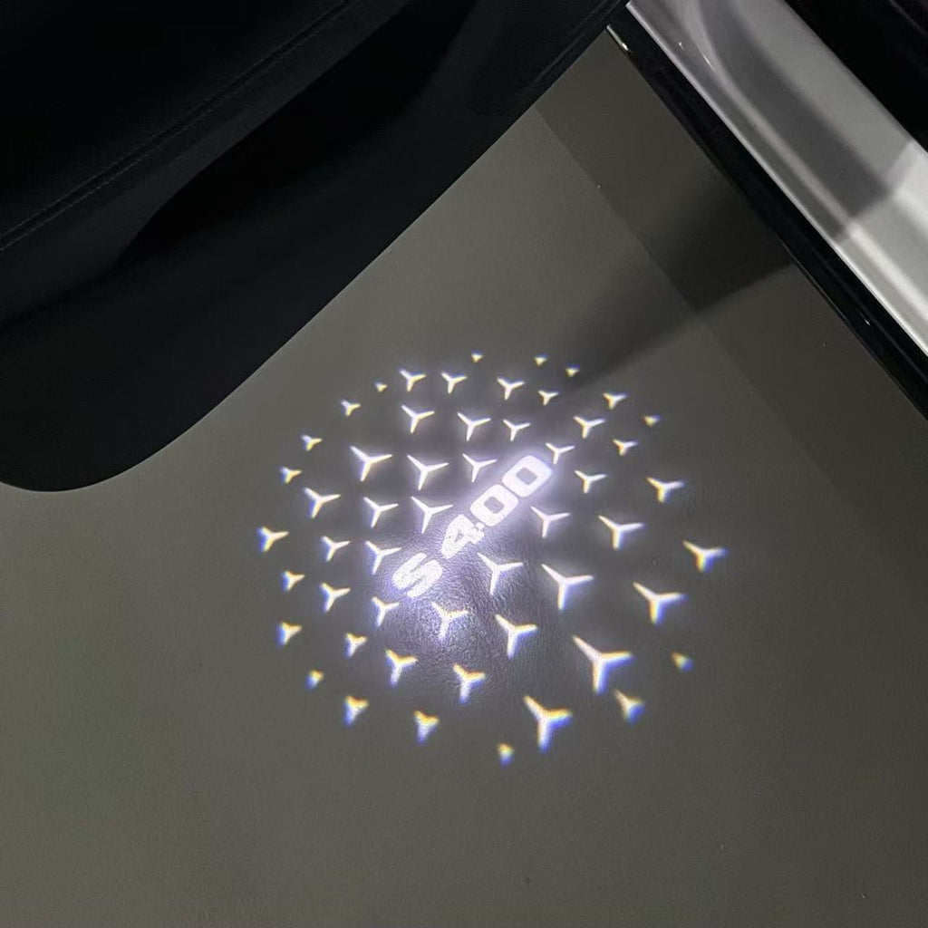 LUCI PROIETTORI LOGO MERCEDES BENZ Nr.03 (quantità 1 = 1 set / 2 luci porta)