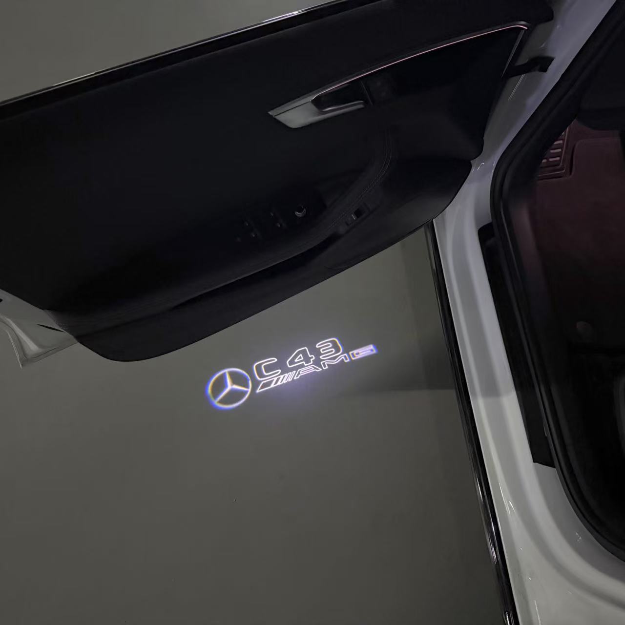 LUCI PROIETTORI LOGO MERCEDES BENZ Nr.03 (quantità 1 = 1 set / 2 luci porta)