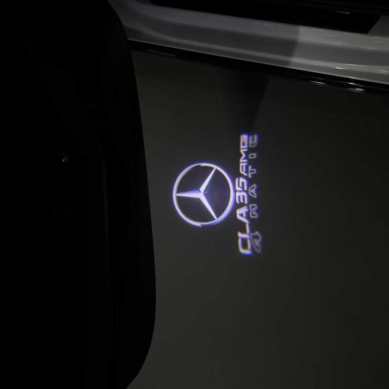 LUCI PROIETTORI LOGO MERCEDES BENZ Nr.03 (quantità 1 = 1 set / 2 luci porta)