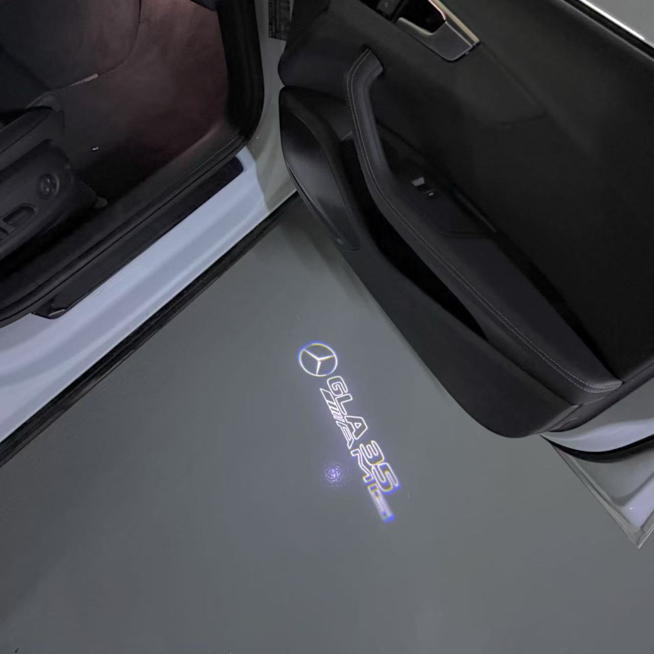 LUCI PROIETTORI LOGO MERCEDES BENZ Nr.03 (quantità 1 = 1 set / 2 luci porta)