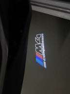 ÉCLAIRAGE DE PROJECTEUR BMW M3 LOGO Nr.24 (quantité 1 = 1 jeux / 2 feux de porte)