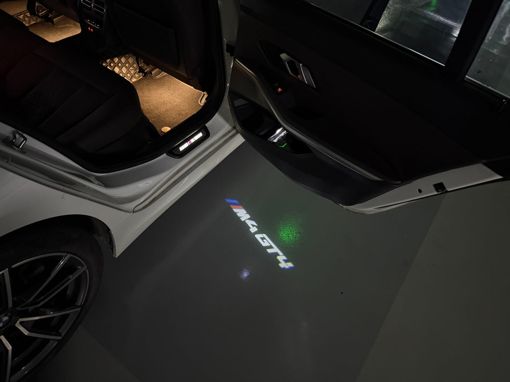 ÉCLAIRAGE DE PROJECTEUR BMW M3 LOGO Nr.24 (quantité 1 = 1 jeux / 2 feux de porte)