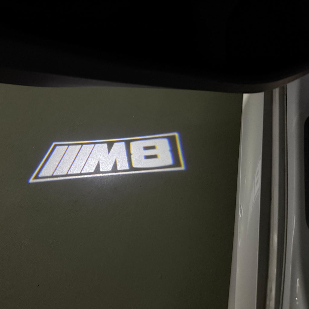 ÉCLAIRAGE DE PROJECTEUR BMW M3 LOGO Nr.24 (quantité 1 = 1 jeux / 2 feux de porte)