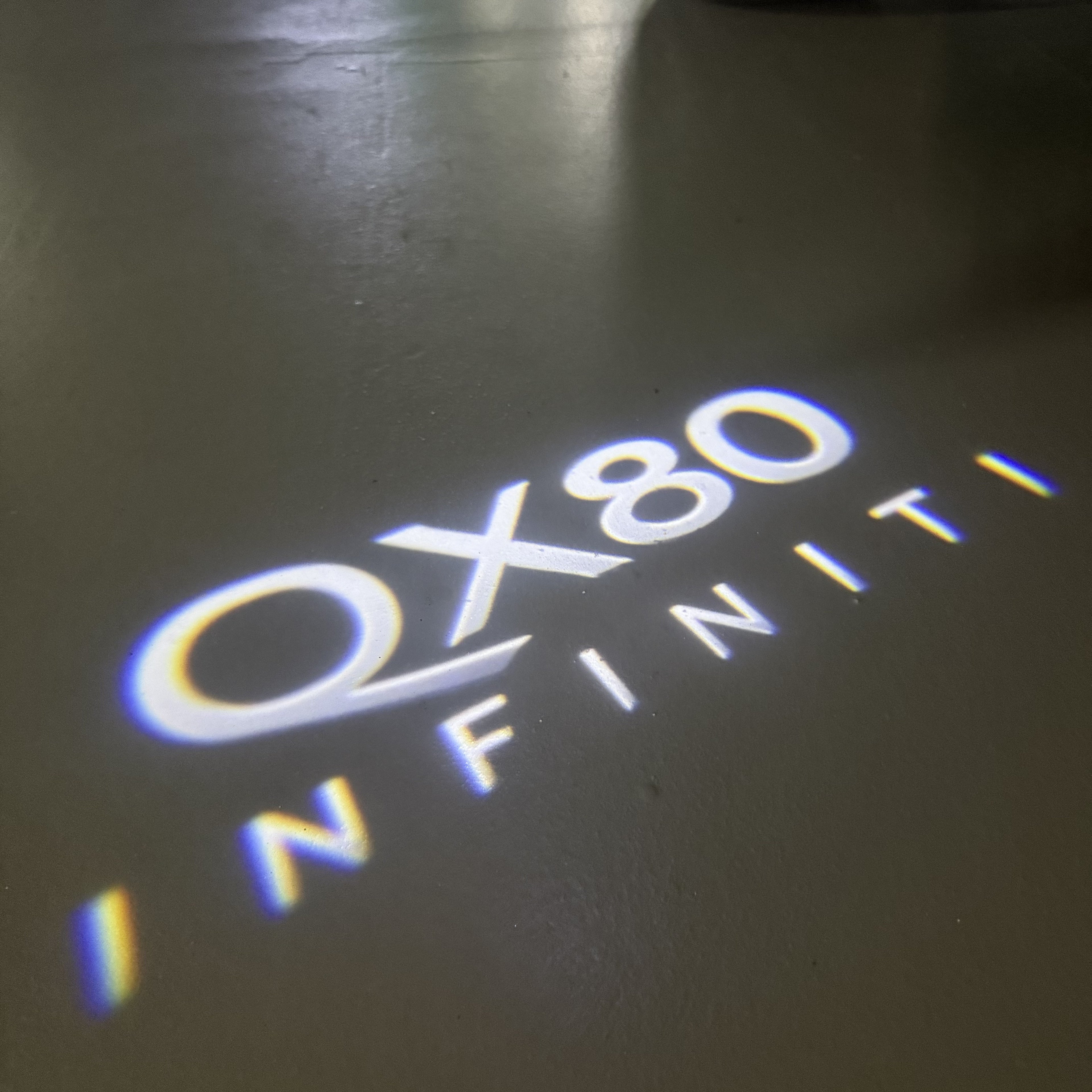INFINTI QX56 LOGO PROJECROTR LIGHTS Nr.74 (quantité 1 = 1 ensemble/2 feux de porte)