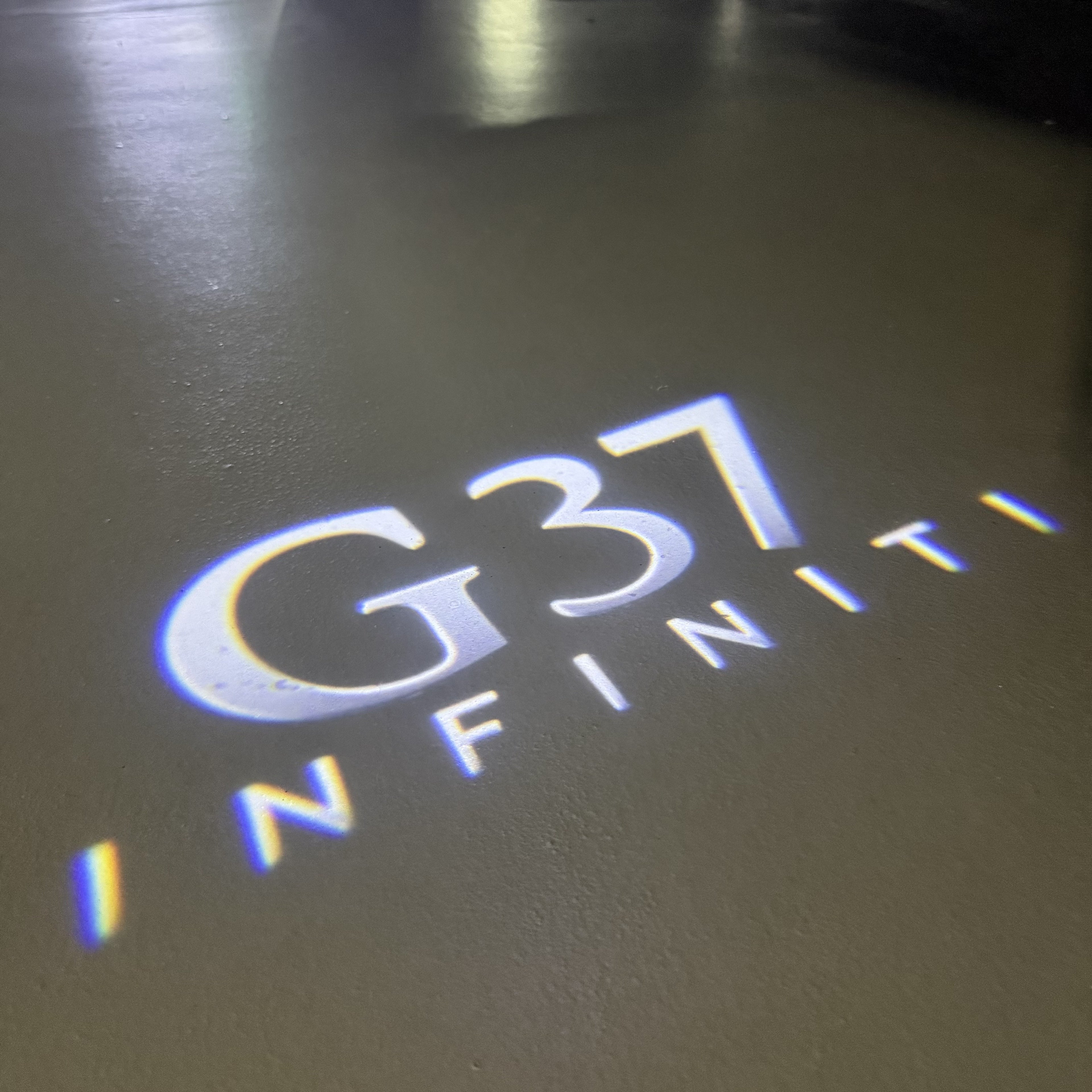 INFINTI QX56 LOGO PROJECROTR LIGHTS Nr.74 (quantité 1 = 1 ensemble/2 feux de porte)
