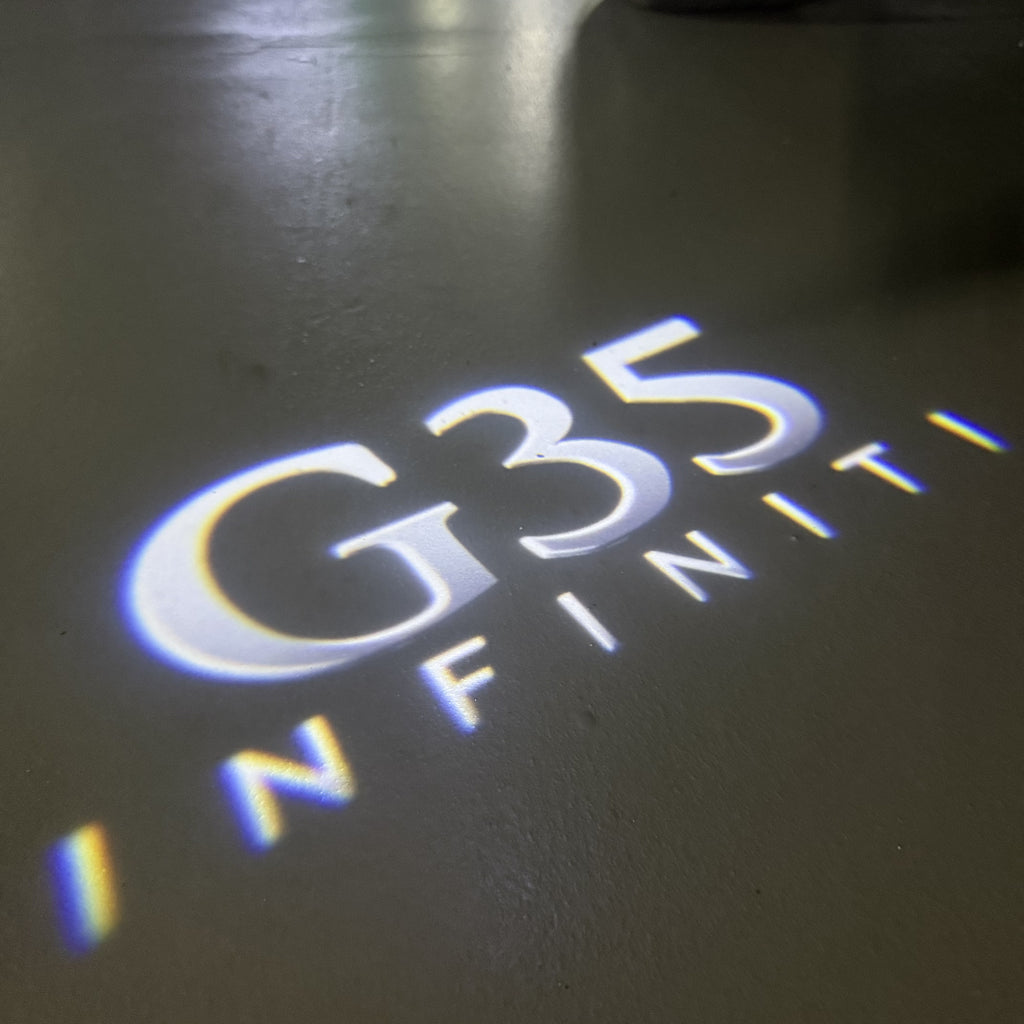 INFINTI QX56 LOGO PROJECROTR LIGHTS Nr.74 (quantité 1 = 1 ensemble/2 feux de porte)