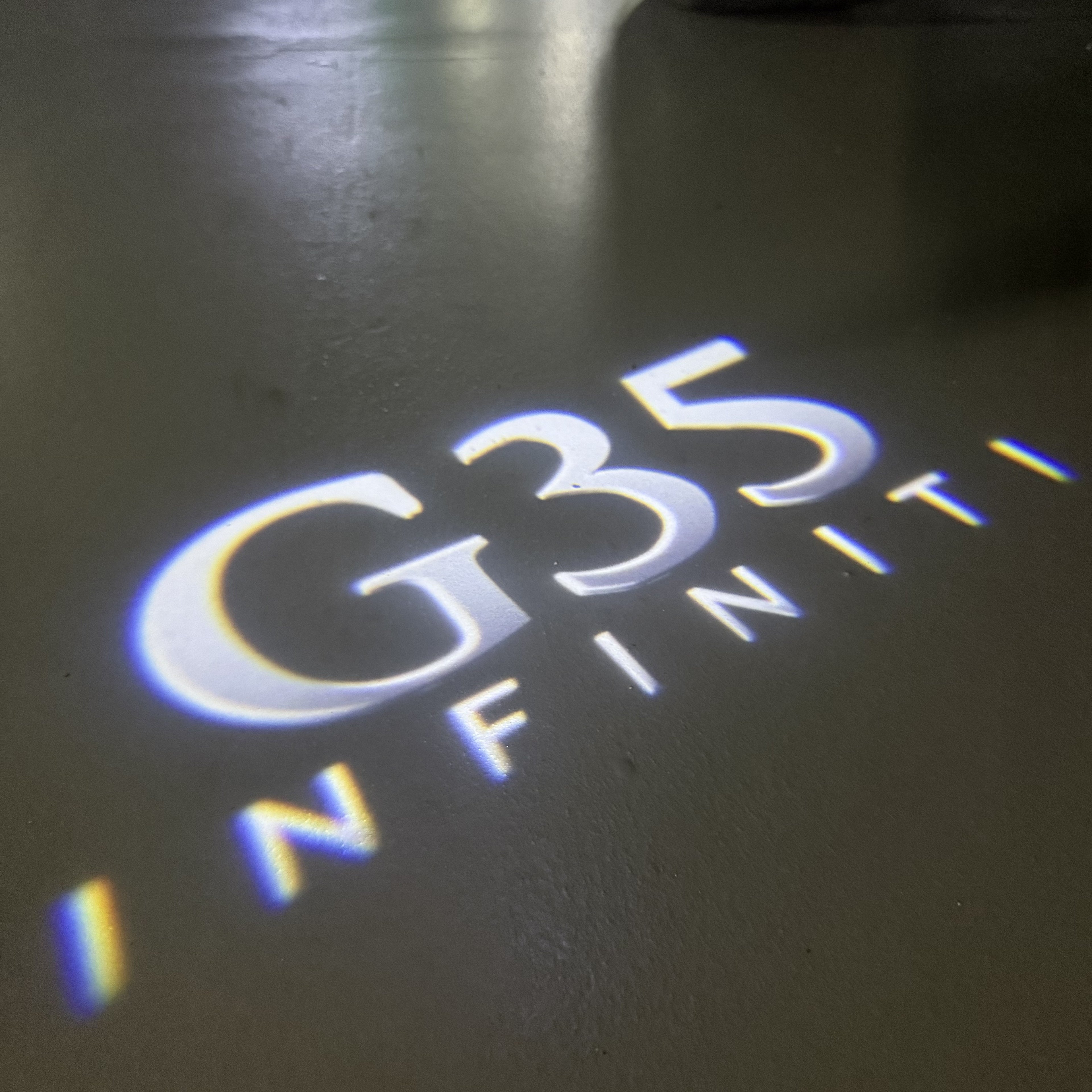 INFINTI QX56 LOGO PROJECROTR LIGHTS Nr.74 (quantité 1 = 1 ensemble/2 feux de porte)