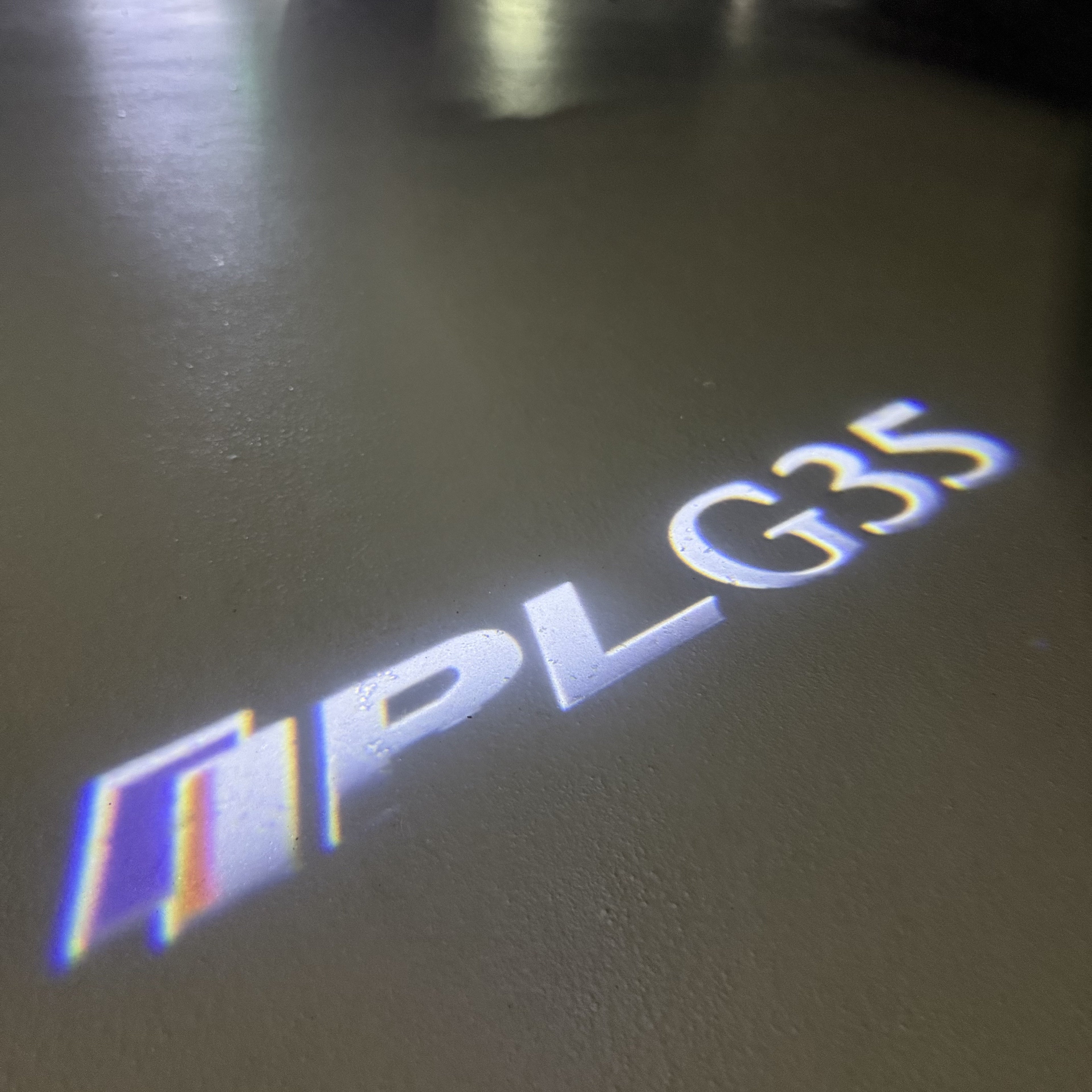 INFINTI QX56 LOGO PROJECROTR LIGHTS Nr.74 (quantité 1 = 1 ensemble/2 feux de porte)