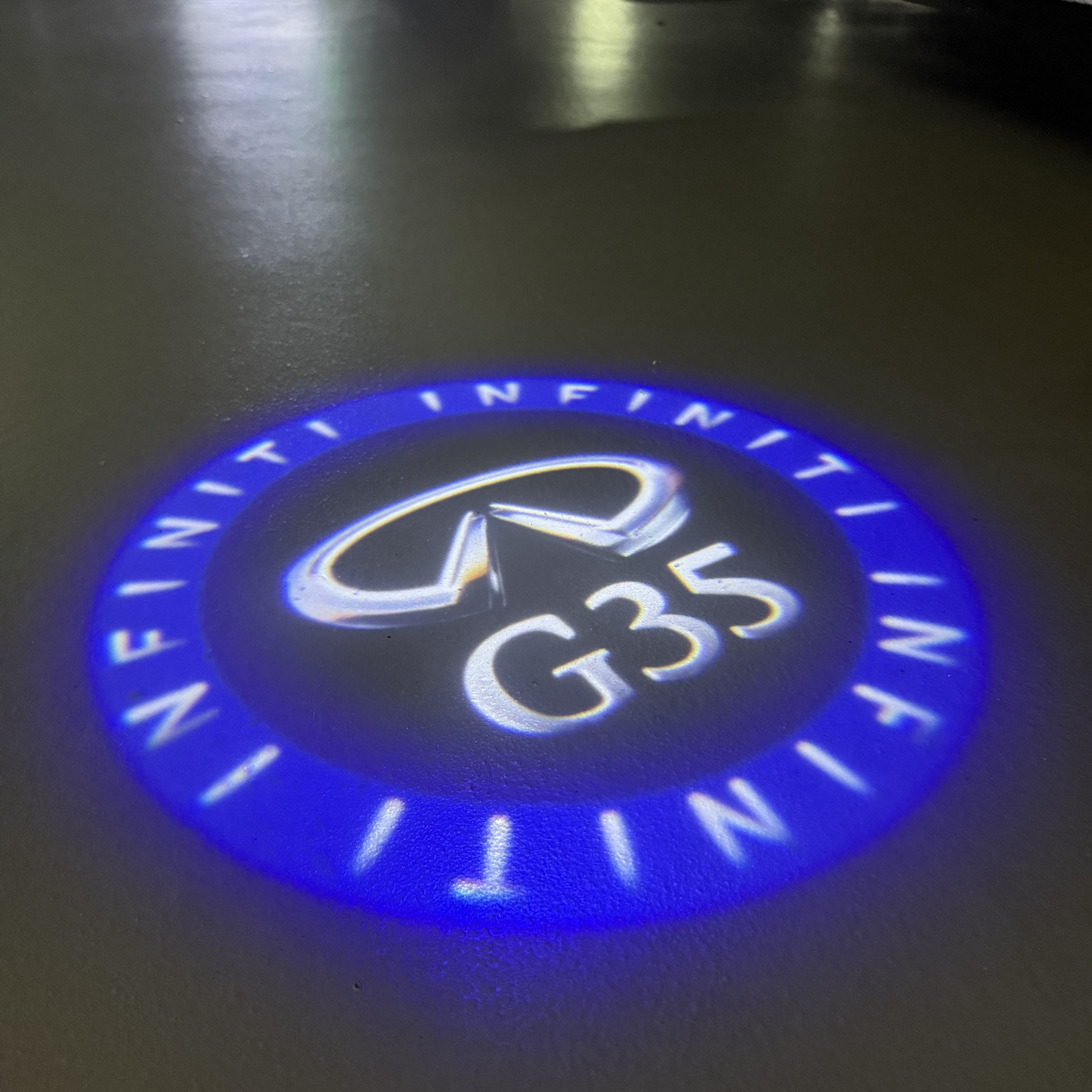 INFINTI QX56 LOGO PROJECROTR LIGHTS Nr.74 (quantité 1 = 1 ensemble/2 feux de porte)