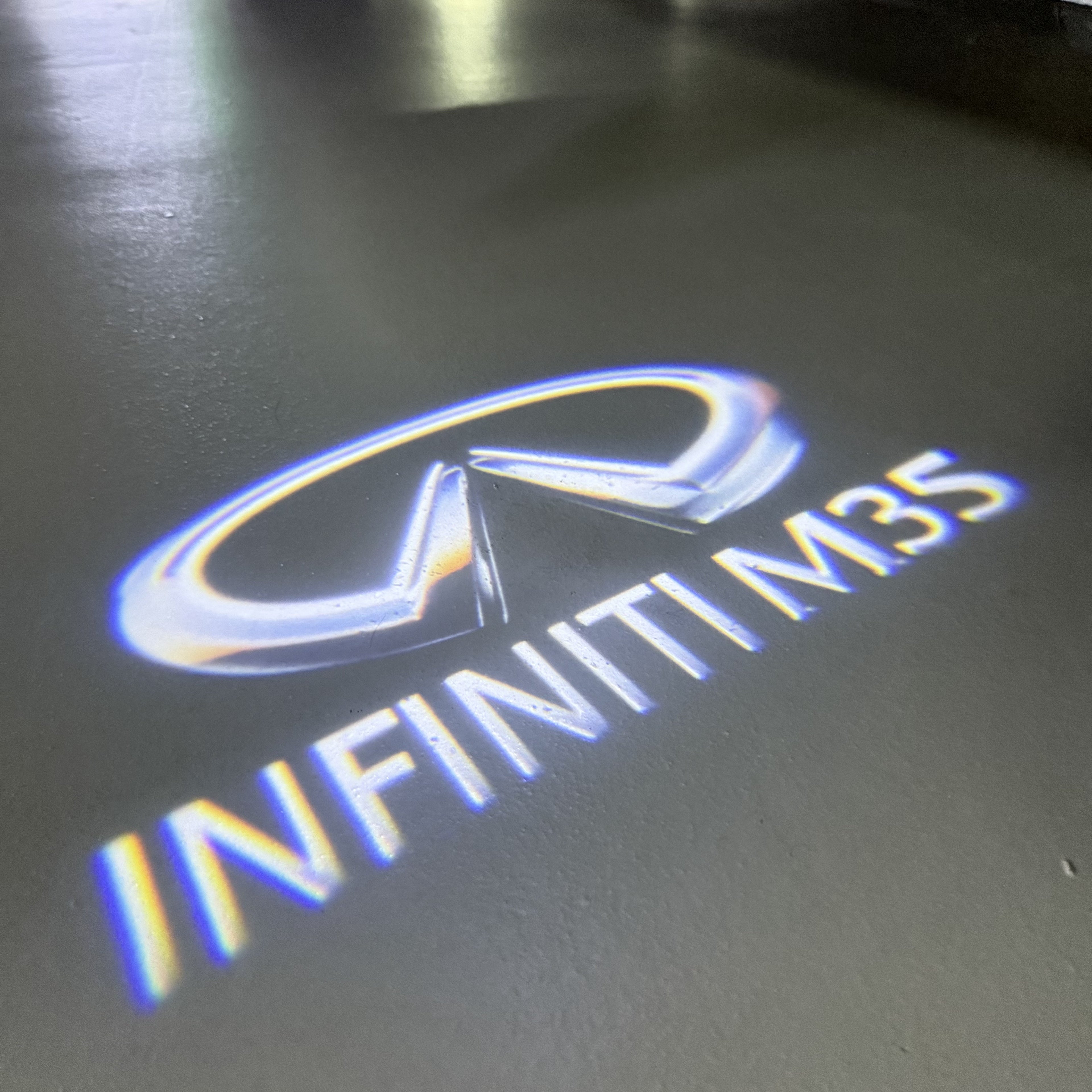 INFINTI QX56 LOGO PROJECROTR LIGHTS Nr.74 (quantité 1 = 1 ensemble/2 feux de porte)