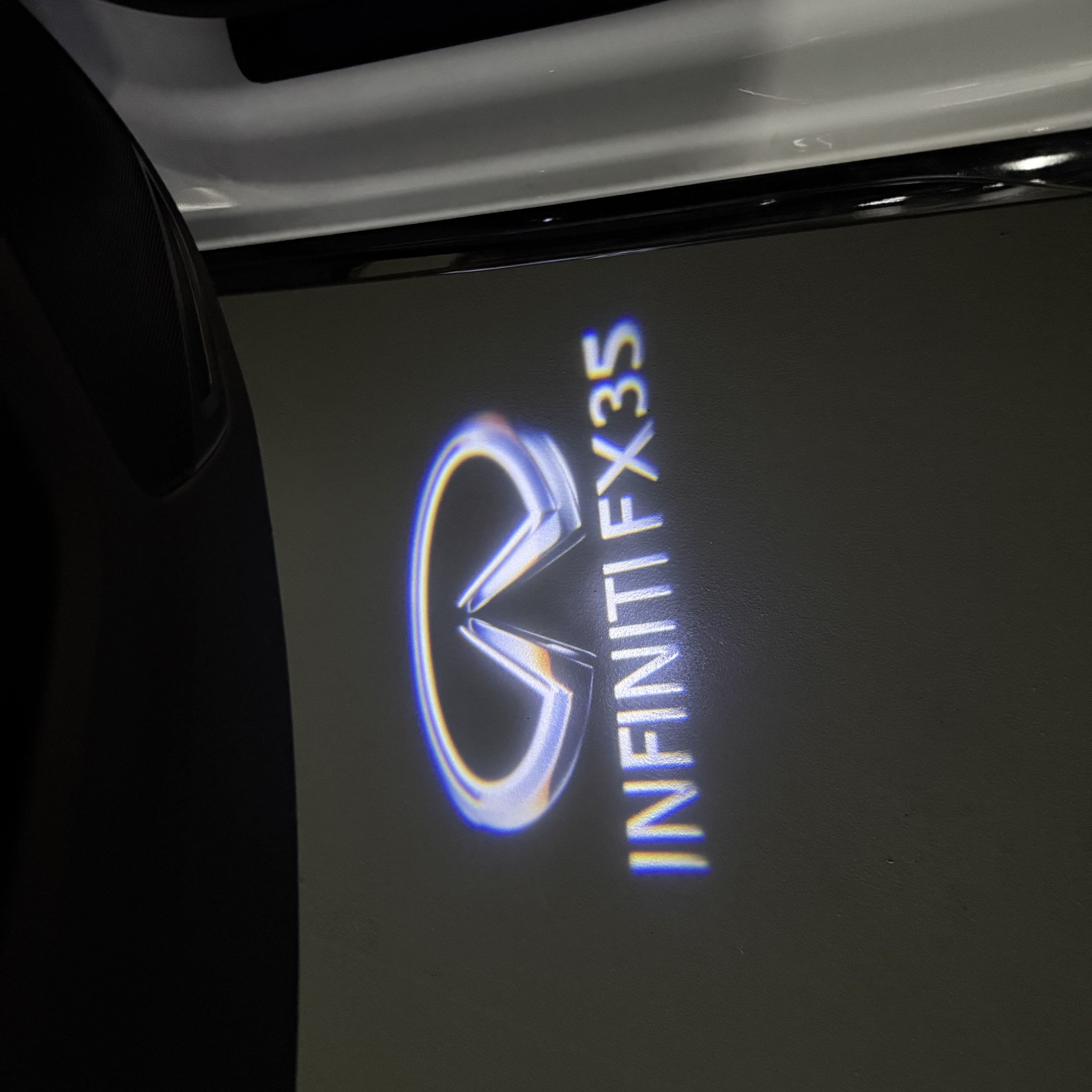 INFINTI QX56 LOGO PROJECROTR LIGHTS Nr.74 (quantité 1 = 1 ensemble/2 feux de porte)