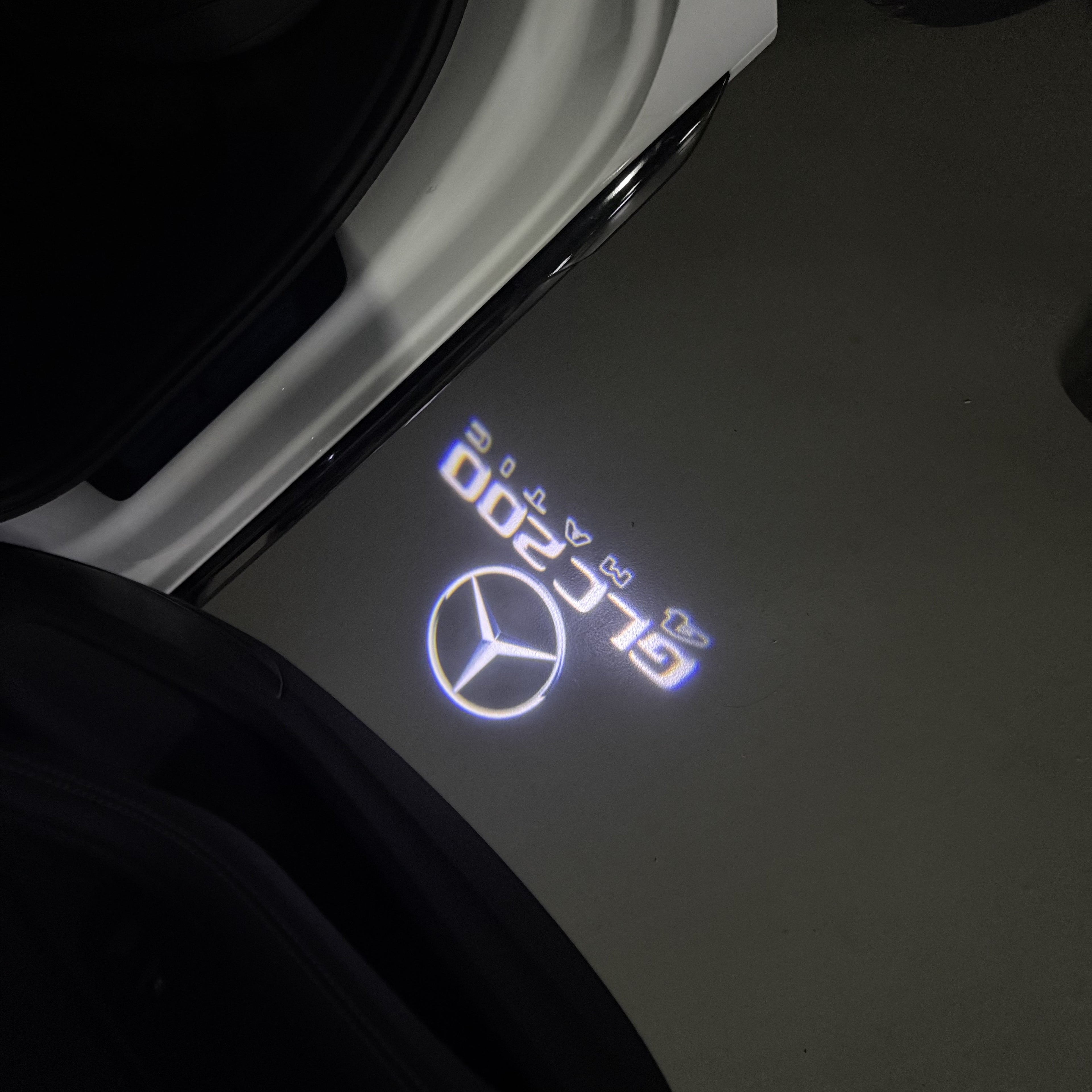LUCI PROIETTORI LOGO MERCEDES BENZ Nr.03 (quantità 1 = 1 set / 2 luci porta)