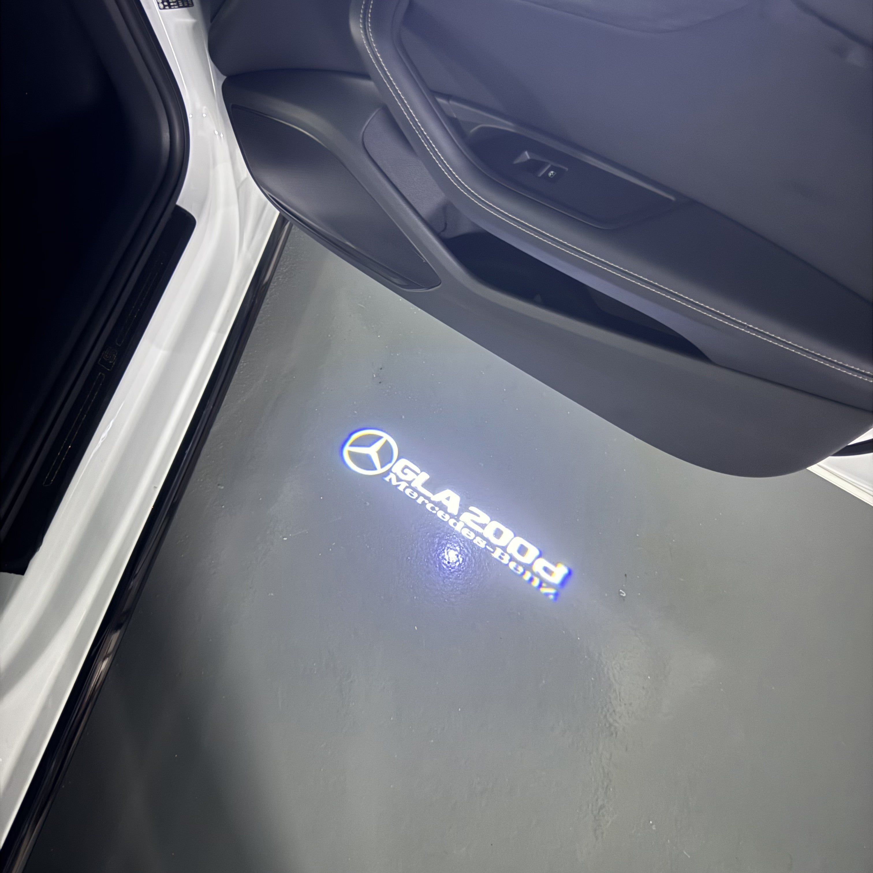 LUCI PROIETTORI LOGO MERCEDES BENZ Nr.03 (quantità 1 = 1 set / 2 luci porta)