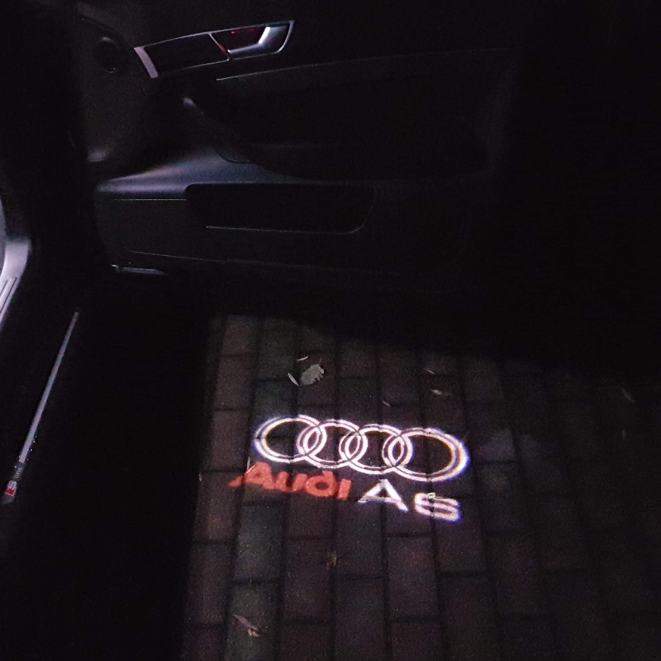 AUDI LOGO PROJECTOT LIGHTS Nr.44 (Menge 1 = 2 Logofolien /2 Türleuchten)