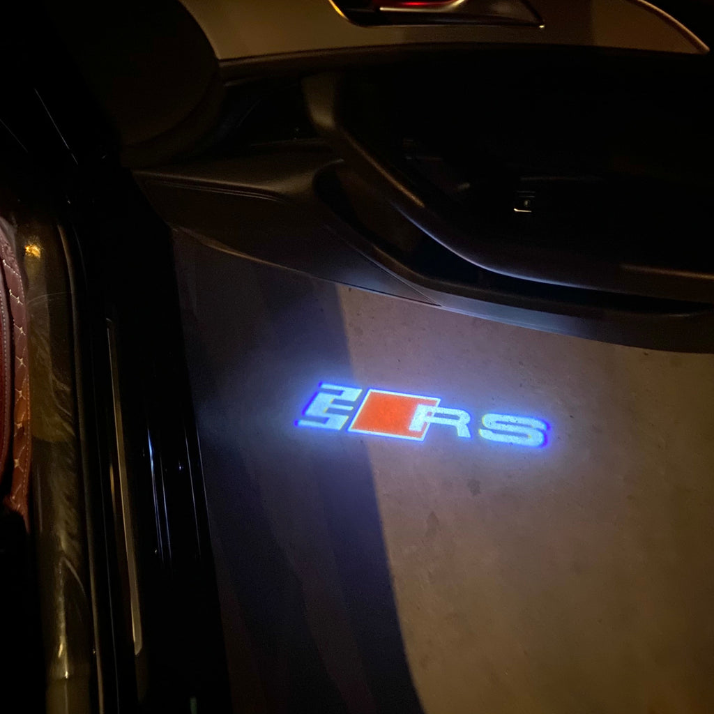 AUDI LOGO PROJECTOT LIGHTS Nr.19 (الكمية 1 = 2 Logo Films /2 أضواء الباب)