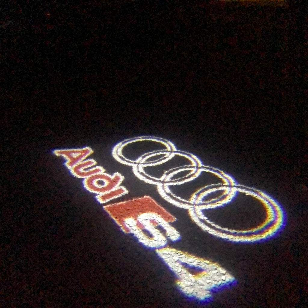 AUDI LOGO PROJECTOT LIGHTS Nr.34 (الكمية 1 = 2 Logo Films /2 أضواء الباب)