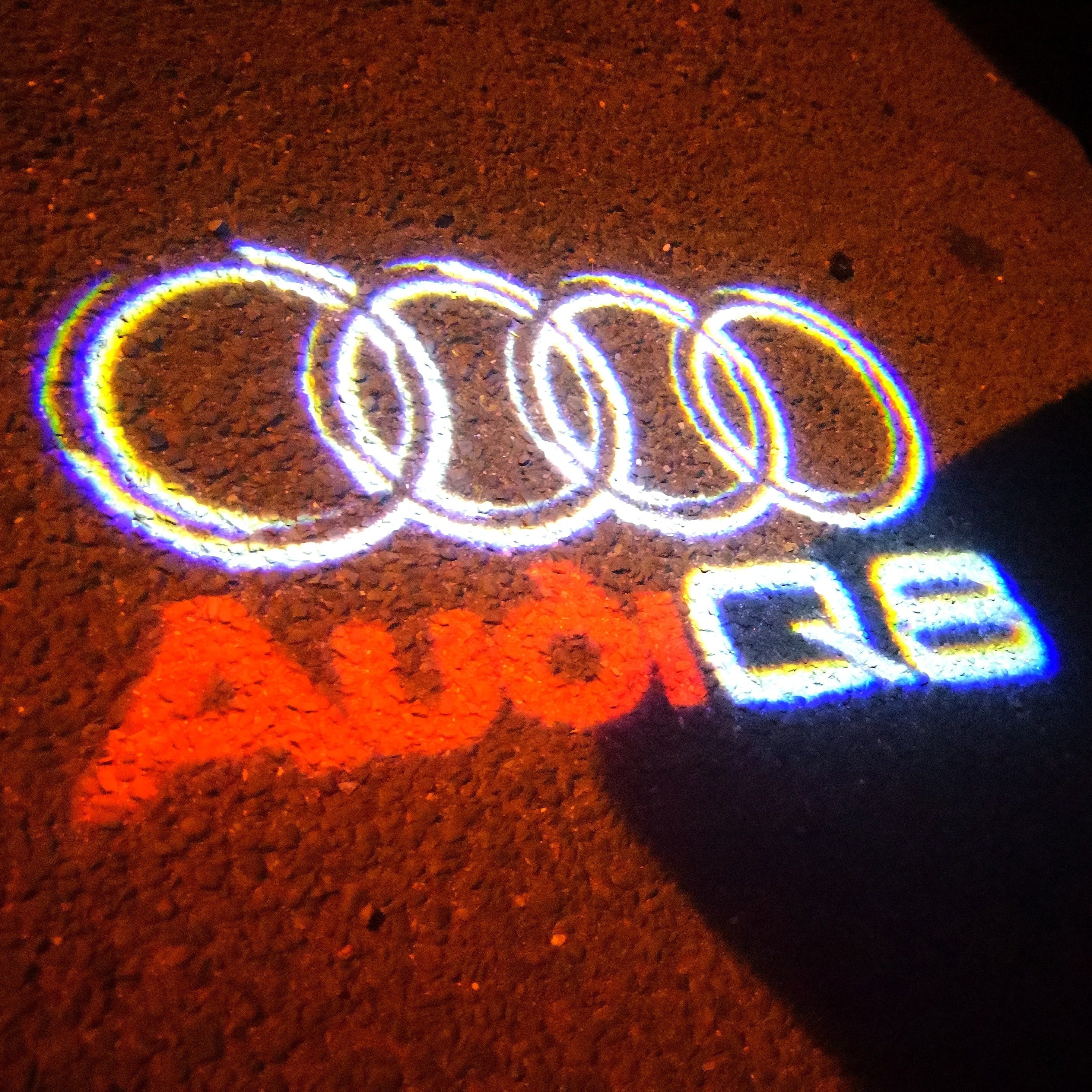 AUDI LOGO PROJECTOT LIGHTS Nr.50 (الكمية 1 = 2 Logo Films /2 أضواء الباب)