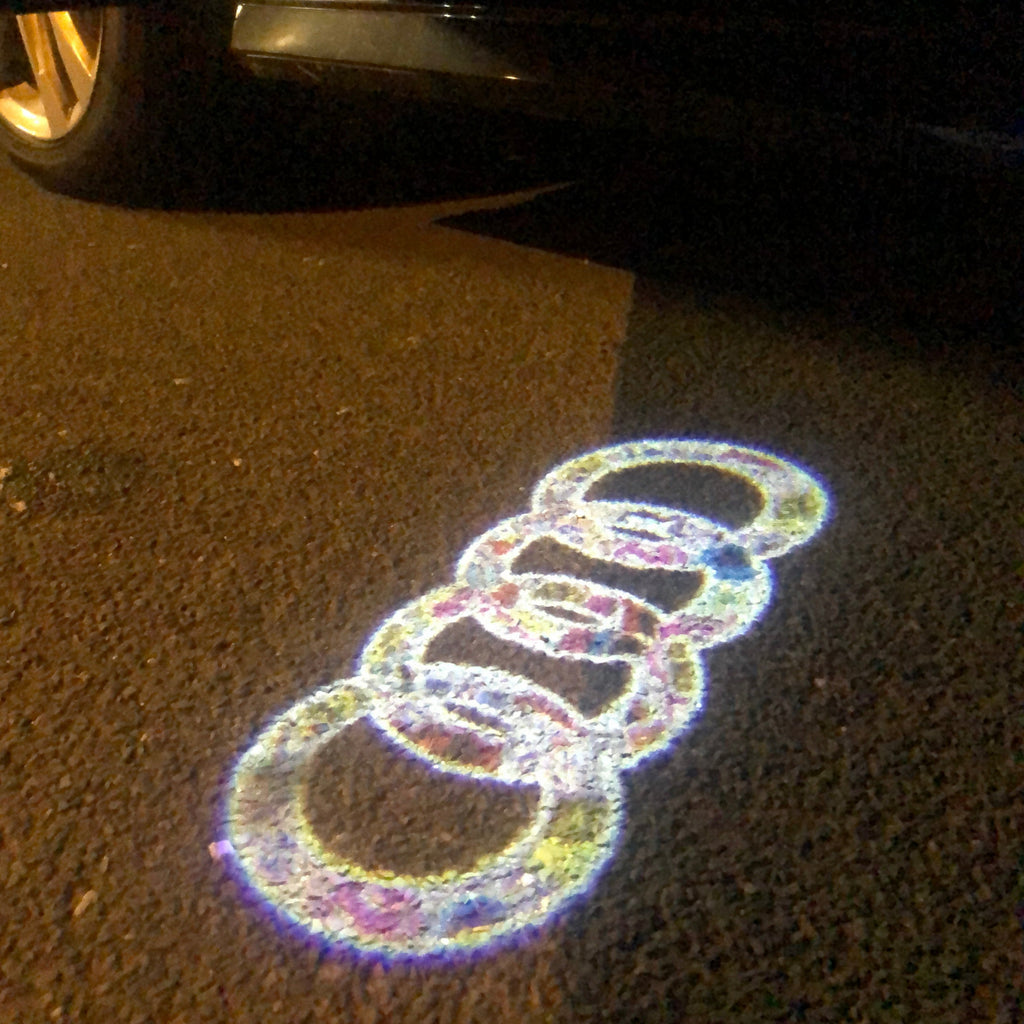 LUCI PROIETTORI LOGO AUDI Nr.10 (quantità 1 = 2 Pellicole Logo / 2 luci porta)