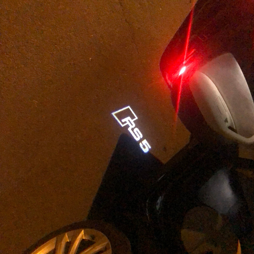 AUDI LOGO PROJECTOT LIGHTS Nr.121 (Menge 1 = 2 Logofolien /2 Türleuchten)