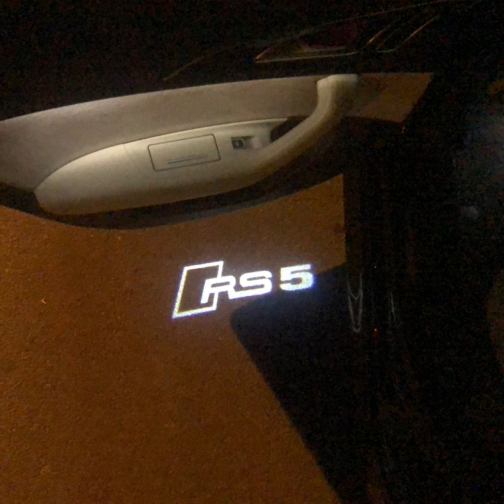 AUDI LOGO PROJECTOT LIGHTS Nr.121 (Menge 1 = 2 Logofolien /2 Türleuchten)