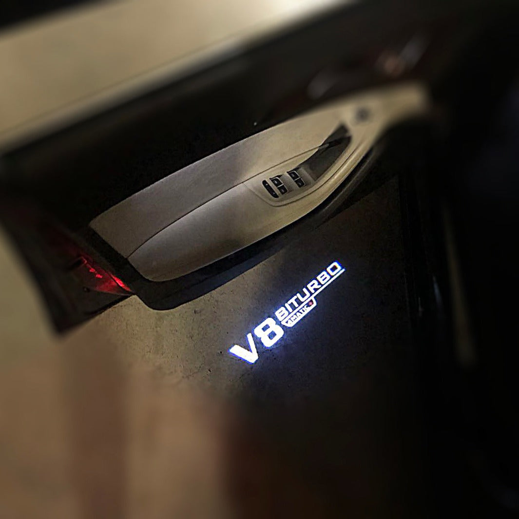 MERCEDES BENZ V8 LOGO PROJECTOT LIGHTS Nr.22 (quantità 1 = 1 set/2 luci porta)
