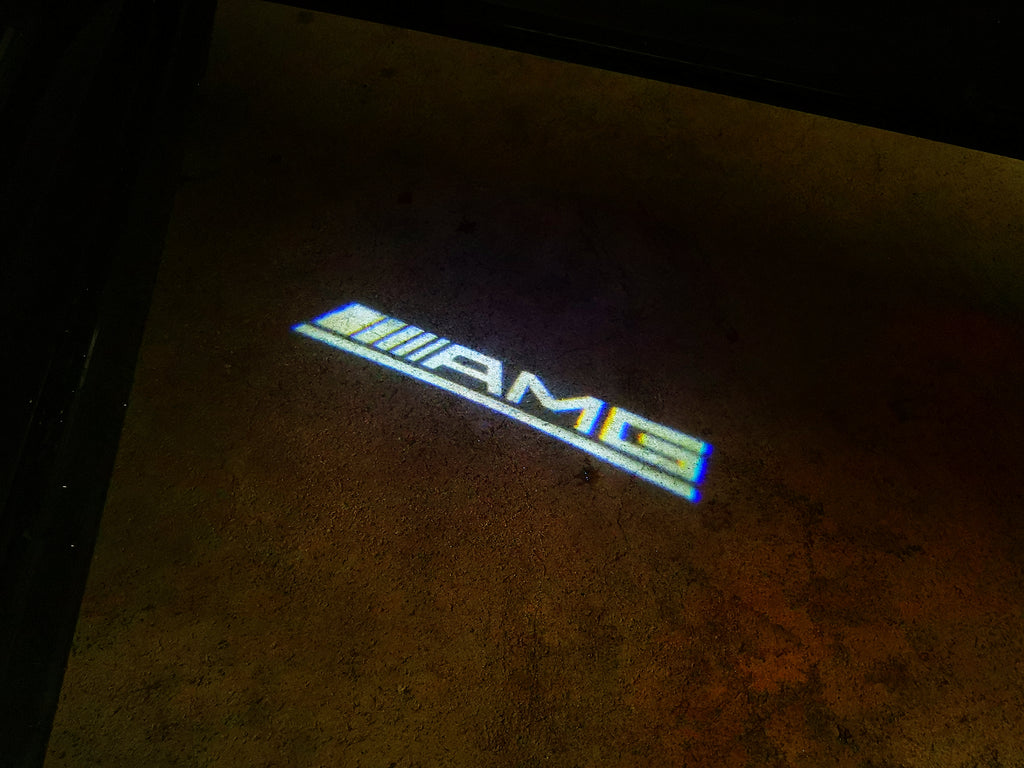 MERCEDES BENZ AMG LOGO PROJECTOT أضواء Nr.13 (كمية 1 = 1 مجموعات / 2 أضواء الباب)