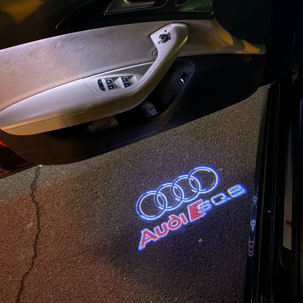 LUCI PROIETTORI LOGO AUDI Nr.255 (quantità 1 = 2 Pellicole Logo / 2 luci porta)