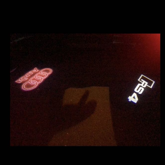 LUCI PROIETTORI LOGO AUDI Nr.118 (quantità 1 = 2 Pellicole Logo / 2 luci porta)