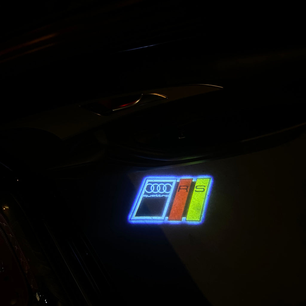 AUDI LOGO PROJECTOT LIGHTS Nr.19 (الكمية 1 = 2 Logo Films /2 أضواء الباب)