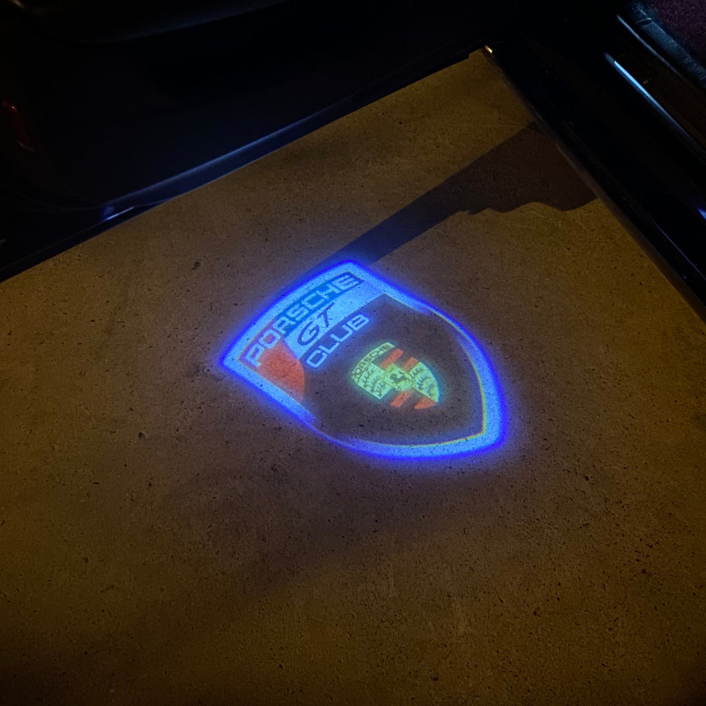 LUCES DE PROYECTOR DE LOGOTIPO ORIGINAL PORSCHE N ° 03 (cantidad 1 = 2 Película de logotipo / 2 luces de puerta)