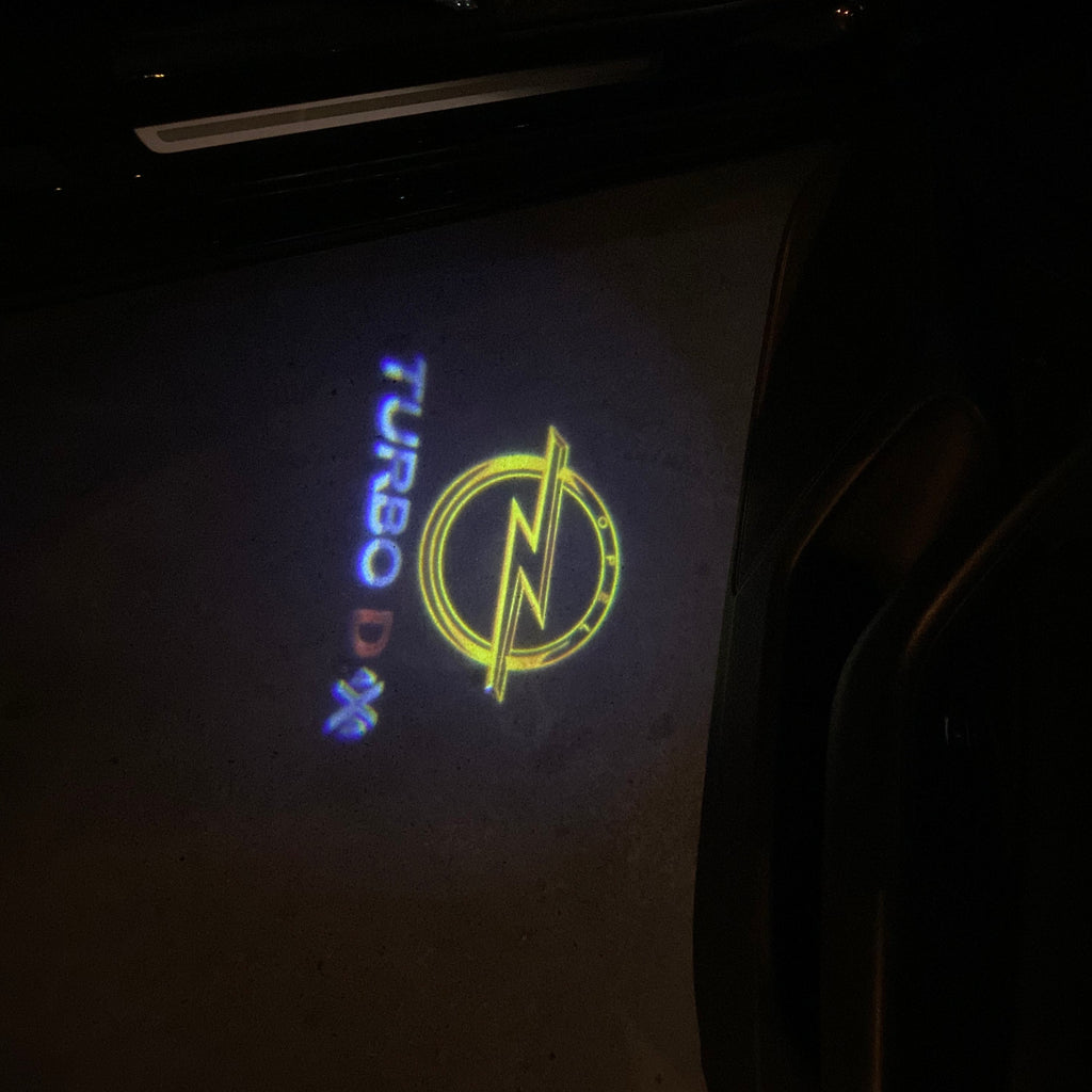 أوبل INSignia LOGO PROJECROTR أضواء Nr.01 (كمية 1 = 1 مجموعات / 2 أضواء الباب)