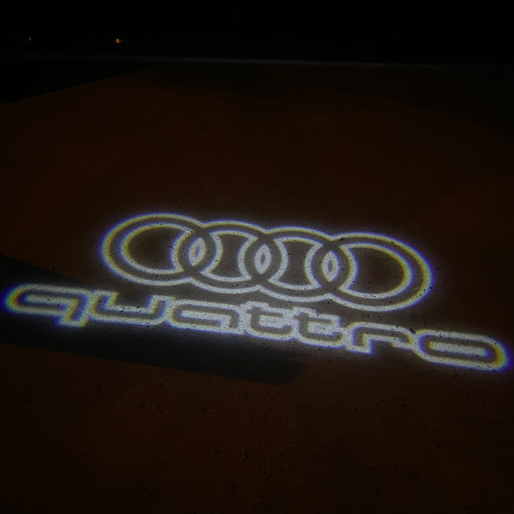 AUDI LOGO PROJECTOT LIGHTS Nr.19 (الكمية 1 = 2 Logo Films /2 أضواء الباب)