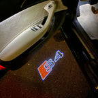 AUDI LOGO PROJECTOT LIGHTS Nr.19 (الكمية 1 = 2 Logo Films /2 أضواء الباب)