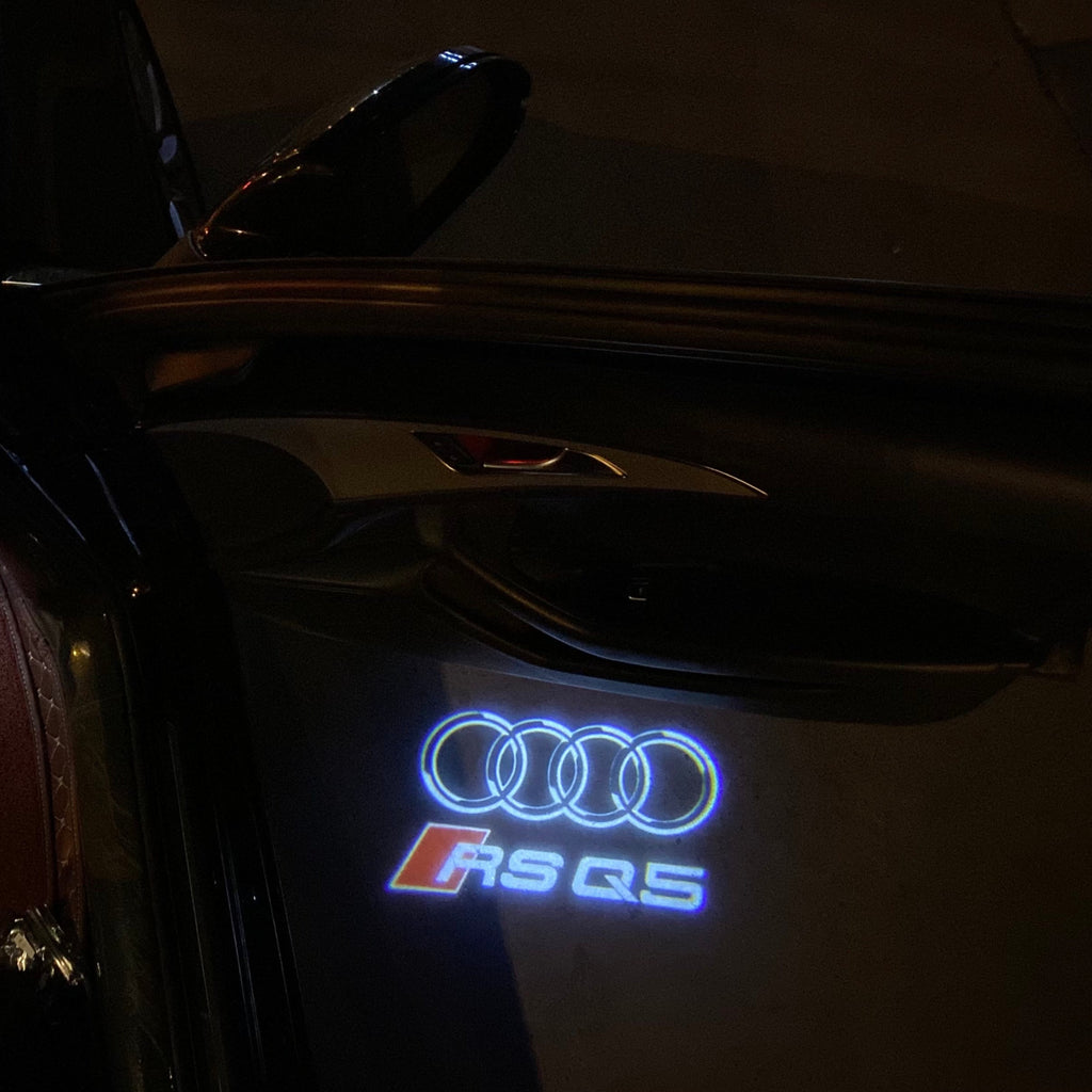 AUDI LOGO PROJECTOT LIGHTS Nr.19 (الكمية 1 = 2 Logo Films /2 أضواء الباب)