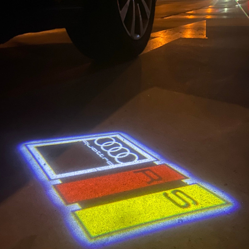 AUDI LOGO PROJECTOT LIGHTS Nr.19 (الكمية 1 = 2 Logo Films /2 أضواء الباب)