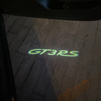 LUCI PROIETTORI LOGO ORIGINALI PORSCHE Nr.03 (quantità 1 = 2 Logo Film / 2 luci porta)