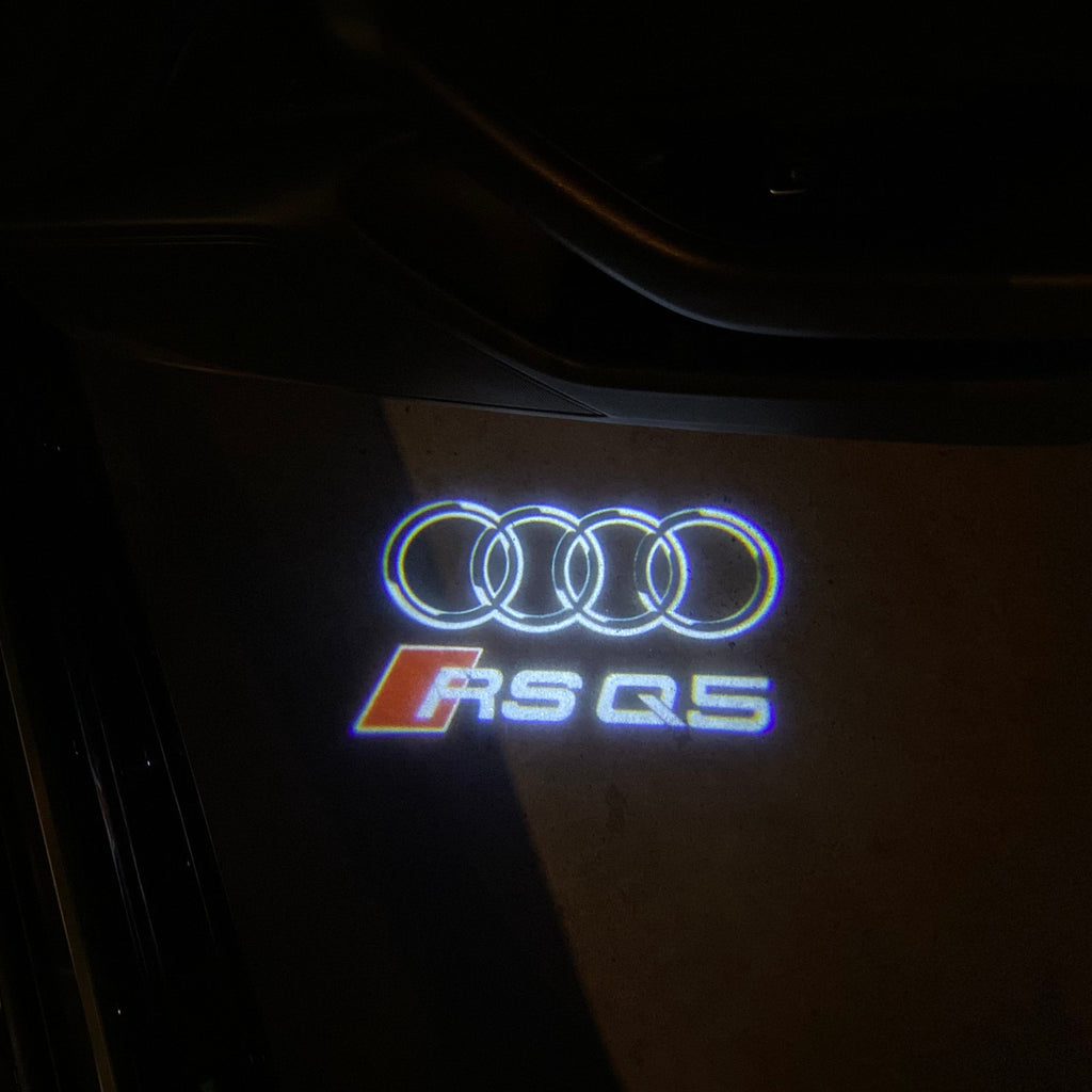 AUDI LOGO PROJECTOT LIGHTS Nr.19 (الكمية 1 = 2 Logo Films /2 أضواء الباب)